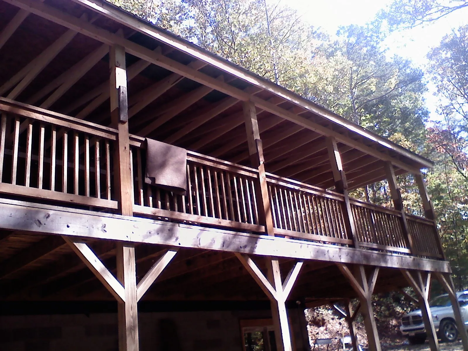 Timber framing under a new elevated porch and deck — Roof Leak Repair in Southington by Roofing Brothers
